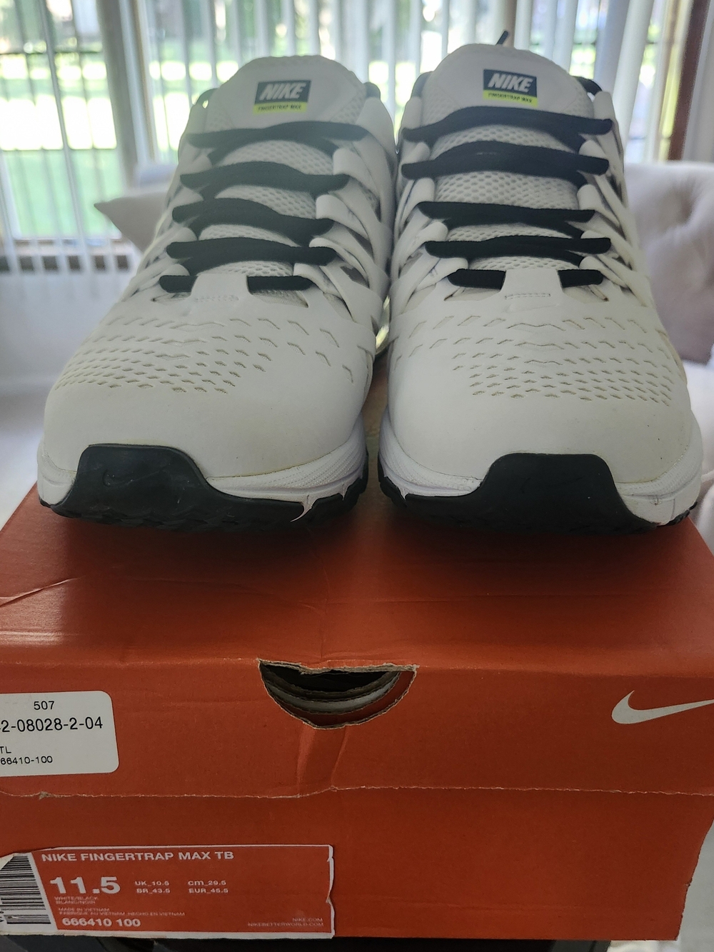 Nike Men’s White Athletic Running Shoes with Black Accents